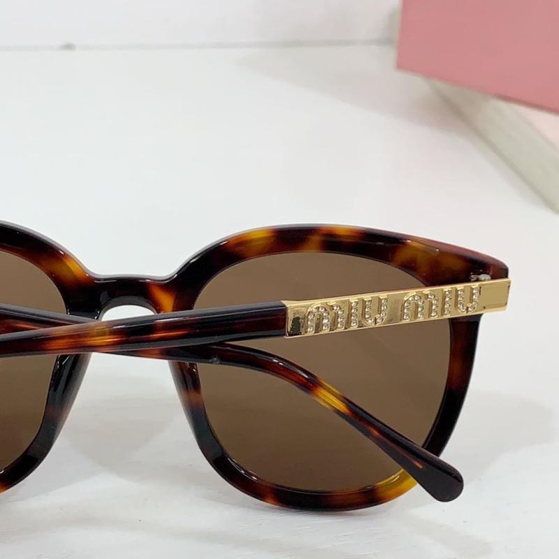 Miu miu Sunglasses